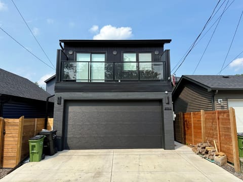 Guest house exterior- South facing balcony, excellent for sun. Interior has blackout blinds for sleep and temperature comfort. 
