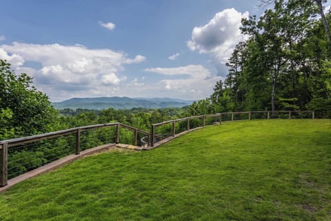 Wake up to a wall of mountains from your own backyard — this lawn puts the whole ridge on display.