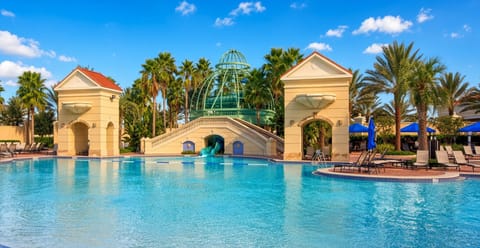 Main Pool • Archways & Green Waterslide Structure