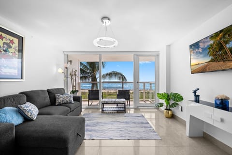 Living Room with Ocean Views
Relax in the living room with a 50-inch TV and one of Miami Beach’s most desirable ocean views. Step onto your private balcony, enjoy a fresh coffee, watch the sunrise, and feel the ocean breeze right from your stay.