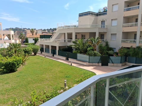 Views of the palm-fringed grounds from the balcony, with the beach just a short walk down the road