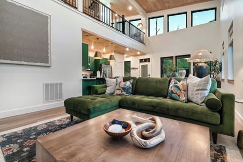 Soaring windows, a floating loft, and natural light from every side.