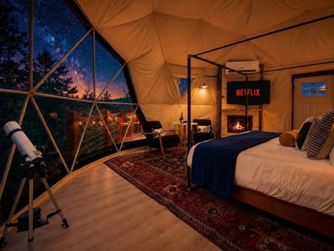 Glamping, upgraded - AC/heat, fireplace glow, and coffee three steps from the bed