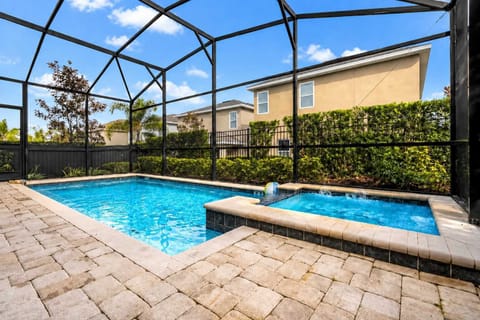 Private screened pool with attached whirlpool