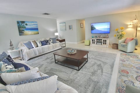 Gather together in the large family room space; comfortable & inviting!