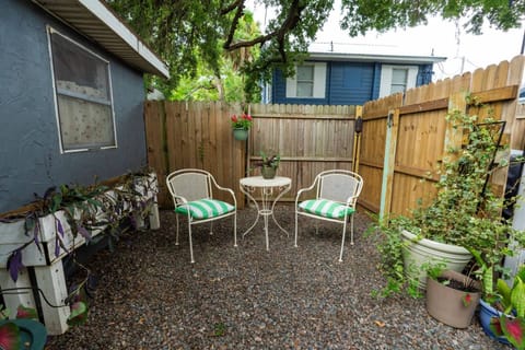 Wind down after exploring Tampa with a drink and comfortable seating in your private backyard, only accessible through the back door