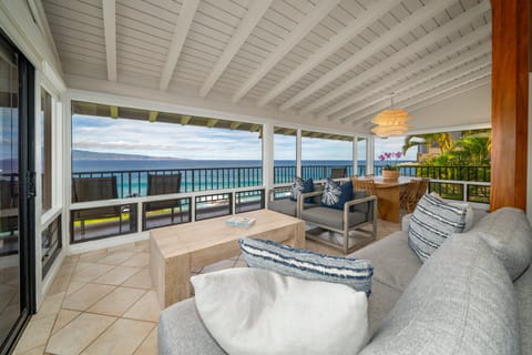 Covered outdoor lounge overlooking the coastline.