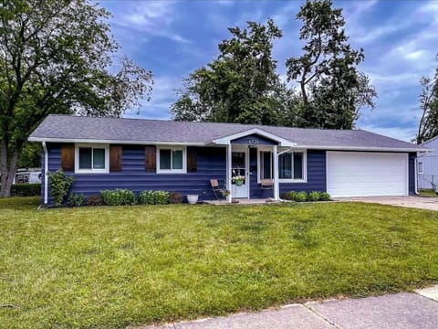 Classic ranch-style curb appeal with a manicured lawn welcomes you home the moment you pull in.