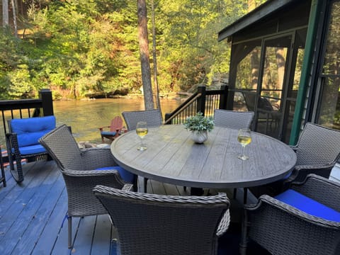 Enjoy meals, morning coffee, and river views from the spacious riverside deck.