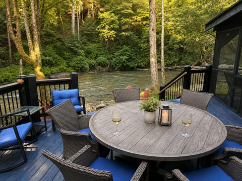 Enjoy meals, morning coffee, and river views from the spacious riverside deck.