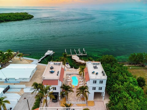 Surrounded by swaying palms and turquoise waters, this is island living at its best.