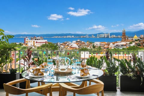 Enjoy one-of-a-kind views of the ocean, mountains, and Guadalupe’s Church from your private balcony