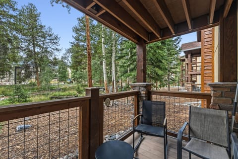 Relax on your private covered deck overlooking towering pines and peaceful mountain surroundings. The natural wood finishes and fresh alpine air make this the perfect spot to unwind with morning coffee or an evening drink.