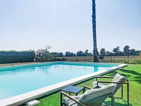 Blue, Swimming Pool, Resort, Shade, Outdoor Furniture, Leisure, Lawn, Landscaping, Estate, Eco Hotel