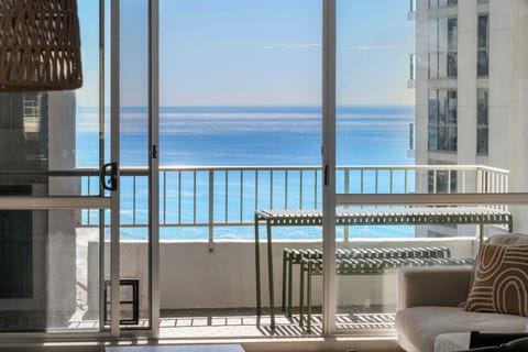 Step inside and be greeted by sparkling ocean views, flowing through the living area and out to your private balcony overlooking Surfers Paradise.