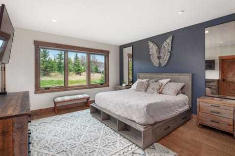Unwind in a serene king suite with calming views.