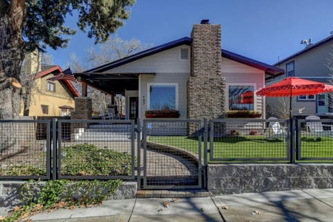 A classic craftsman facade with a welcoming front porch sets the tone for your stay.