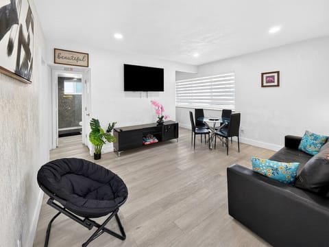 Comfortable living room with a Smart TV and cozy seating