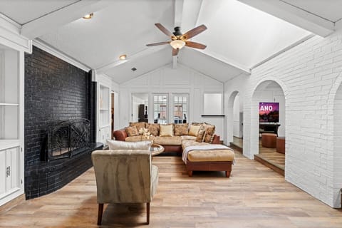 Unwind beneath soaring ceilings and timeless architectural details that create an open, luxurious atmosphere.