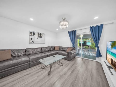 Comfortable couch that can accommodate up to two guests for sleeping.