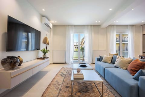 Bright, cheerful sunlight floods this elegant living space, beautifully highlighting every carefully selected design element.