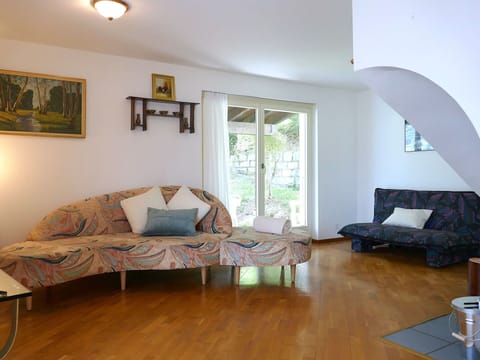 Furniture, Interior Design, Wall, Flooring, Couch, Floor, Wood, Living Room, Wood Flooring, Room
