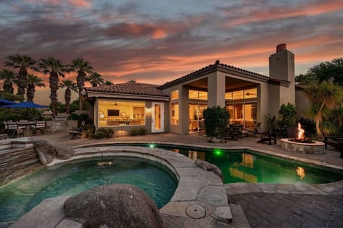 Backyard: private pool/spa, natural gas fire pit with (4) adirondack chairs, conversation seating area under covered patio, propane gas bbq grill island with sink & mini fridge, (4) person seating area