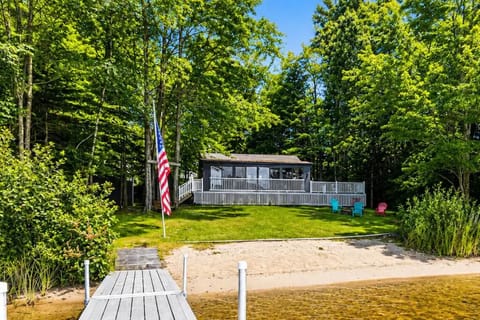 Private Locke Lake waterfront with sandy beach, dock, and Barnstead lake home.