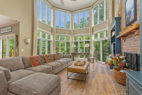 Living room on main floor off the kitchen with view of backyard