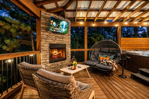 Slip into the hot tub, pour a glass of wine, and let the rest of the world disappear. Your private, covered retreat was made for slow evenings together beneath the pines.