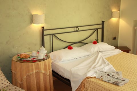 Standard Double or Twin Room | Minibar, in-room safe, blackout drapes, iron/ironing board