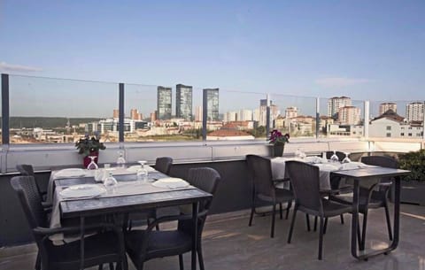 Comfort Double Room, City View | Outdoor dining