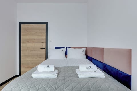 Deluxe Apartment, Balcony, Courtyard View | Iron/ironing board, cribs (surcharge), WiFi (free), bed sheets