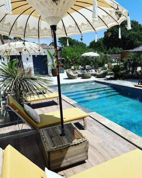Luxury Chalet, Accessible Bathtub, Pool View | Pool | 2 outdoor pools, free cabanas, pool umbrellas