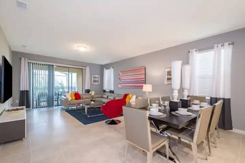 Bright living and dining area with comfortable seating and stylish décor