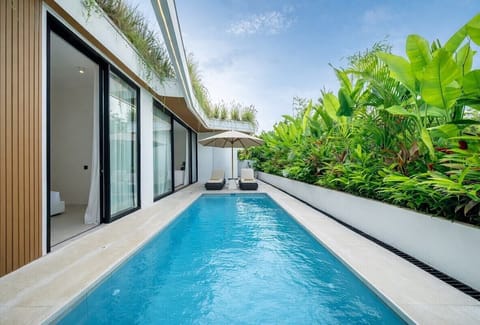 Private Pool Paradise: Dive into luxury with your own pool surrounded by lush tropical greenery!