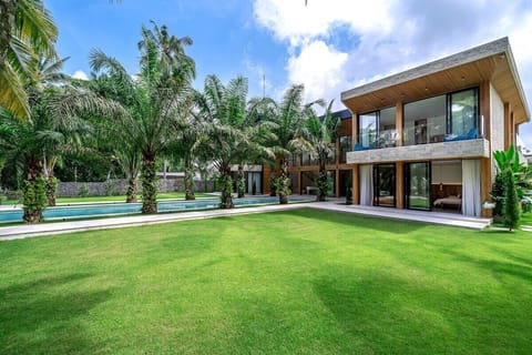 Exterior Oasis: Luxuriate in lush gardens and serene pools, perfect for sunny Bali afternoons!