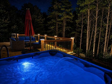 Unwind in the private hot tub just steps from the deck