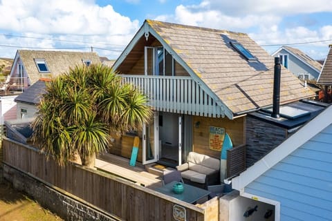 50 Gwithian Towans beach chalet exterior in Gwithian with sea views across St Ives Bay with Forever Cornwall