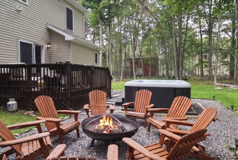 Gather 'round the fire pit under the stars, then soak away the day in your private hot tub — s'mores and stargazing included.