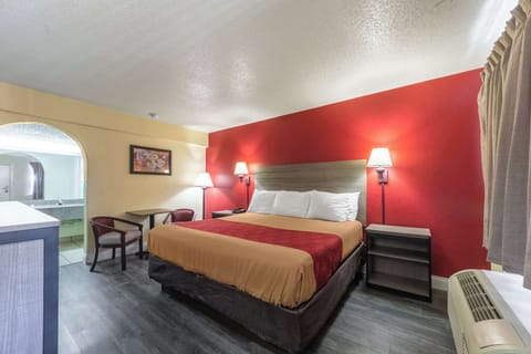 Desk, blackout drapes, iron/ironing board, rollaway beds