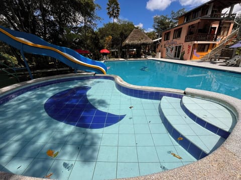 2 outdoor pools, open 10:00 AM to 10:00 PM, pool umbrellas