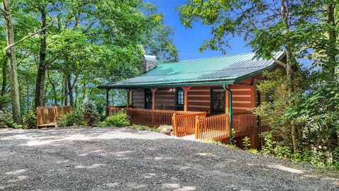 Level parking in front of the cabin.