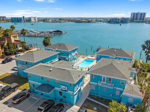 Coral Resort sits right on the water at 483 East Shore Drive — a small, low-rise Clearwater Beach resort with a private pool courtyard, fishing dock and sweeping Intracoastal views, two blocks from the Gulf sand.