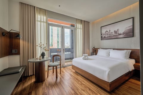 Deluxe Room, City View | In-room safe, desk, laptop workspace, blackout drapes