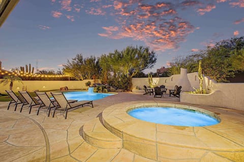 Unwind in the heated spa under the stars