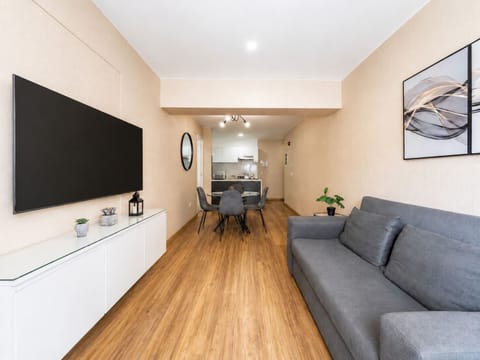 Apartment, 1 Queen Bed with Sofa bed, Refrigerator | Living area | 50-inch Smart TV with digital channels, Netflix, streaming services