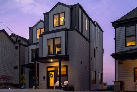 Sleek exterior design meets premier luxury—your private multi-level oasis perched high above the city of Pittsburgh.