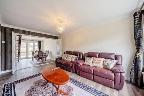 Stretch out on leather recliners in the open living and dining space