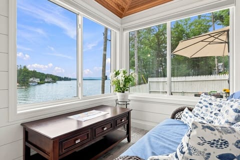 Bright sunroom overlooking the lake